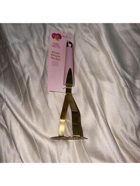 Rare PARIS HILTON HEART STAINLESS  STEEL PARIS HILTON POTATO MASHER